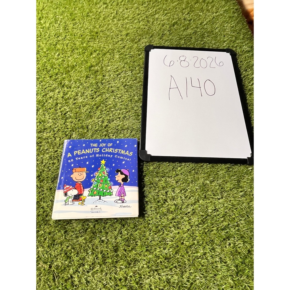 Hallmark The Joy of A Peanuts Christmas 50 Years of Holiday Comics Schulz Book - Picture 2 of 4